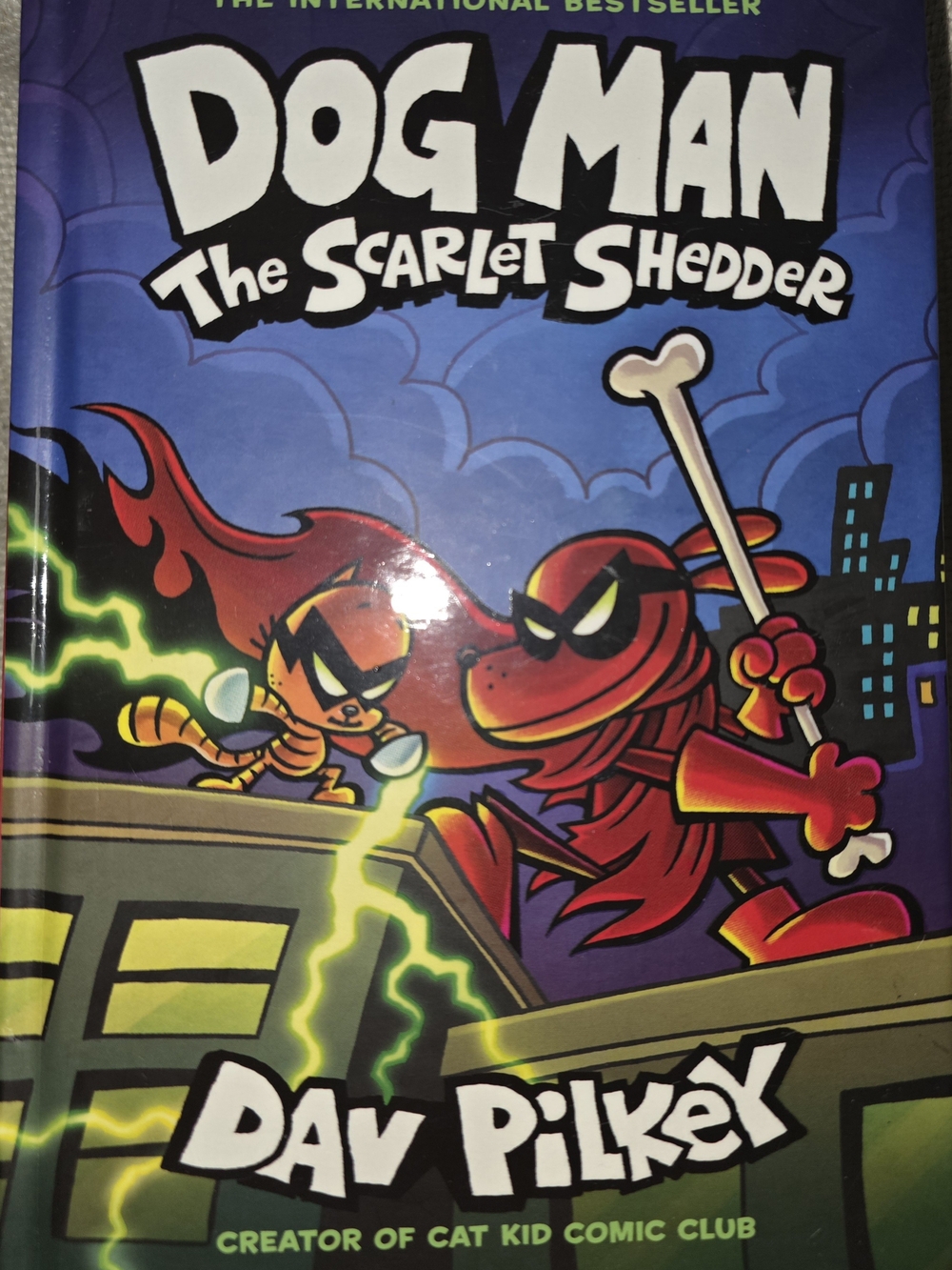 Dog Man: The Scarlet Shedder by Dav Pilkey - Red Hardcover Kids Book